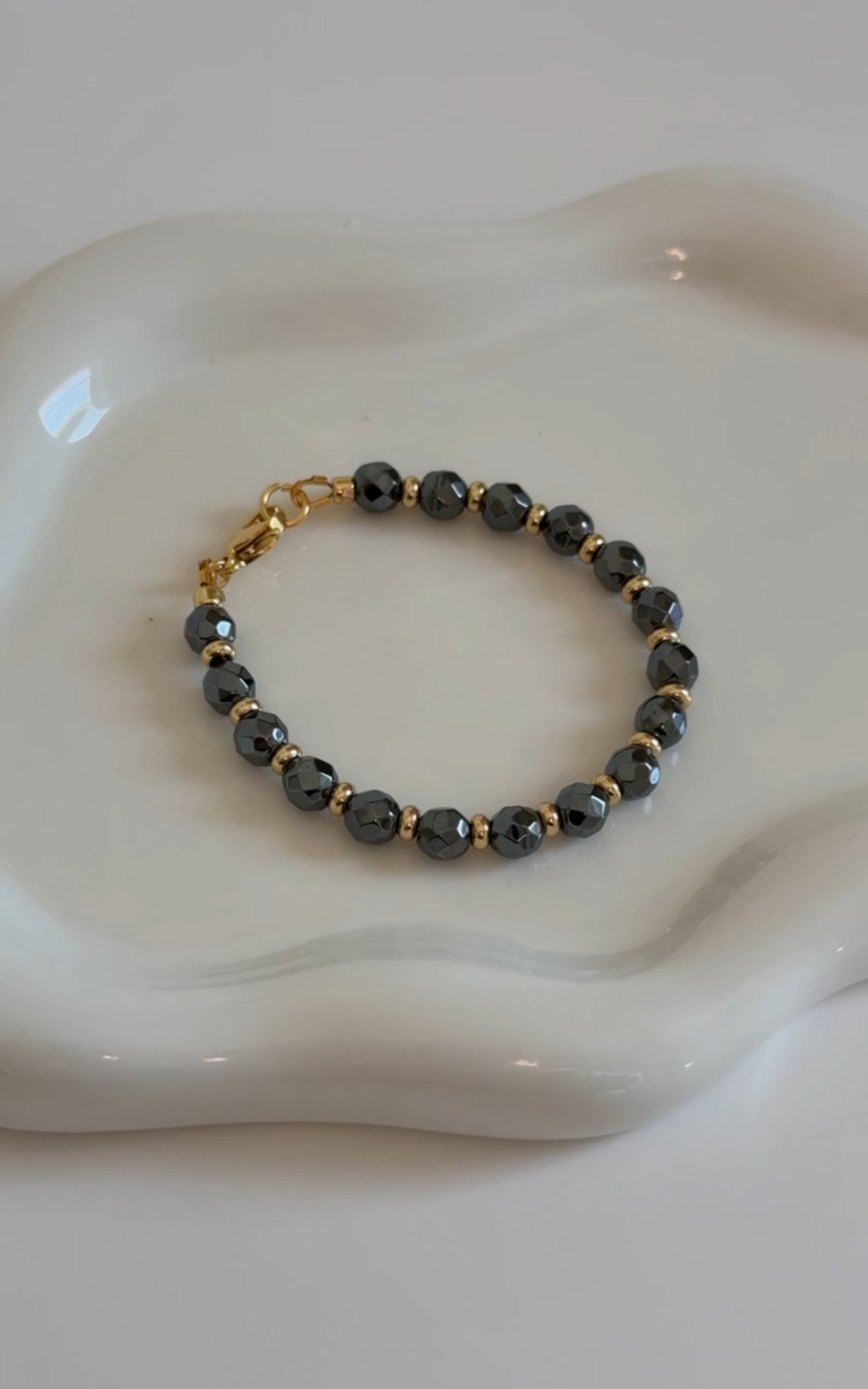 Black Hematite Gold Accent Bracelet